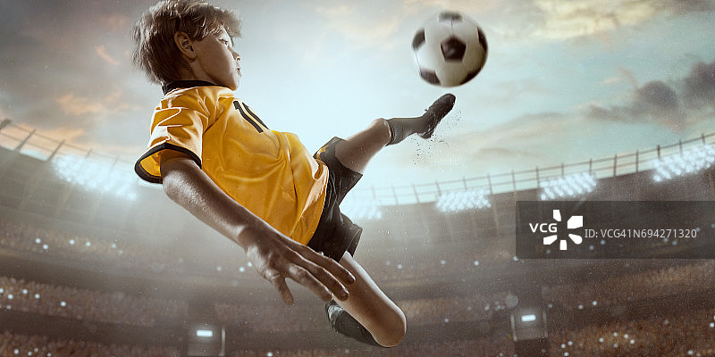 足球孩子球员在行动在3D戏剧性的体育场图片素材