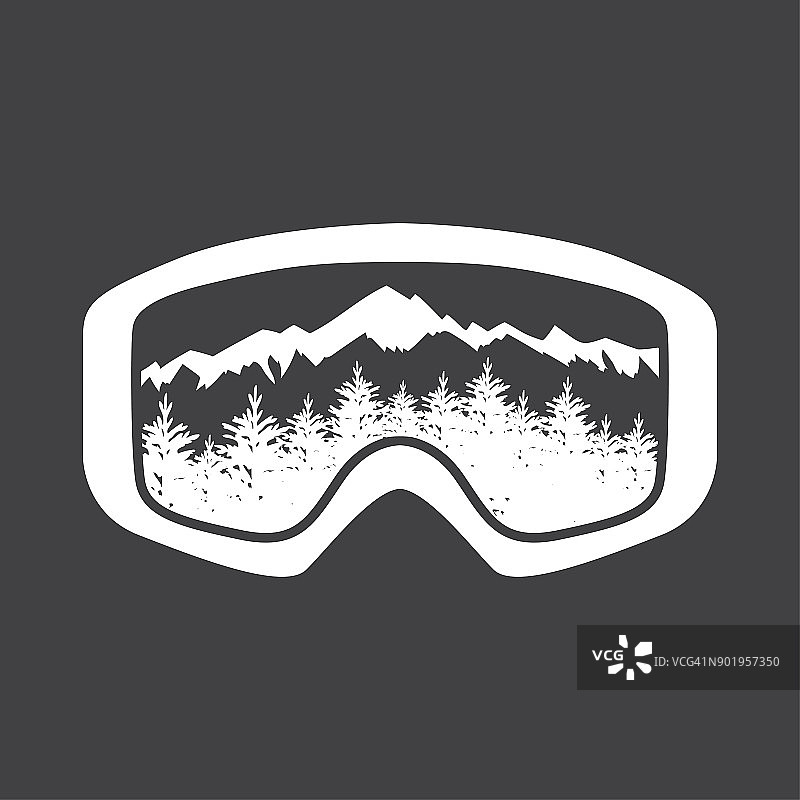山峰在反射着滑雪面罩的镜头。图片素材