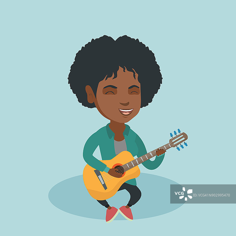年轻的非洲女子在弹原声吉他图片素材