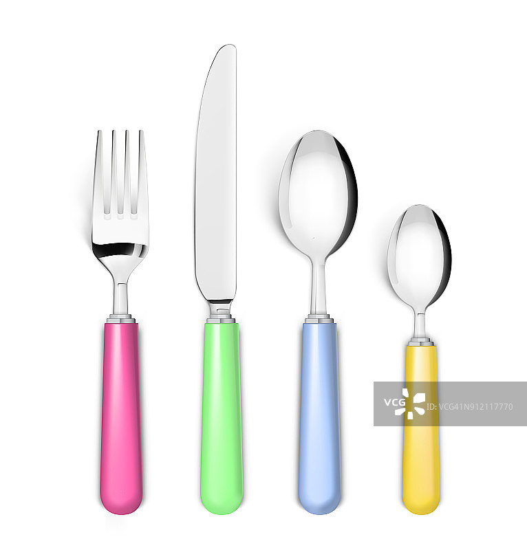 一套刀叉和勺子，刀柄是白色的。图片素材