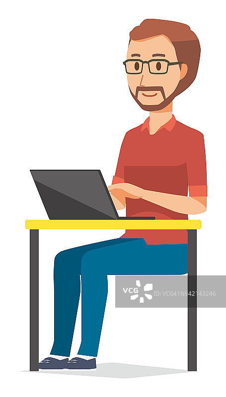 一个戴眼镜的大胡子男人正在操作一台笔记本电脑图片素材