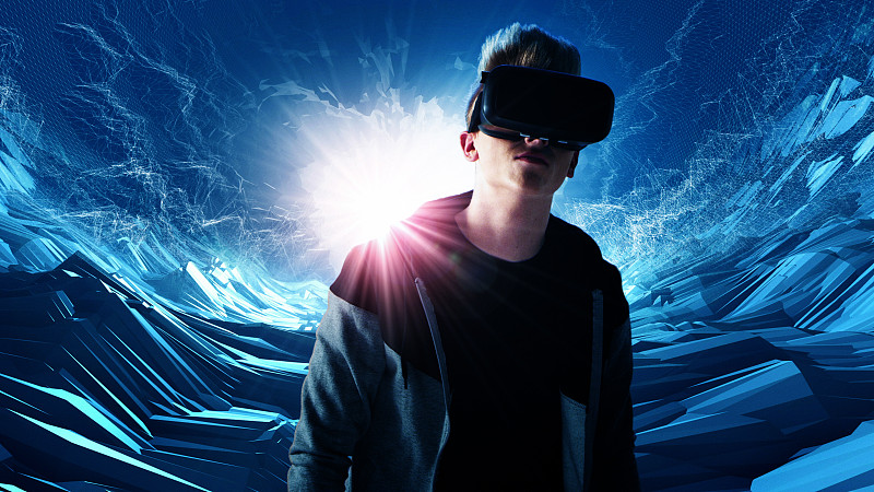 人类探索虚拟现实。VR耳机。宇宙隧道图片下载