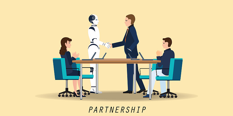 商人和人工智能机器人在会议期间握手达成合作协议。图片下载
