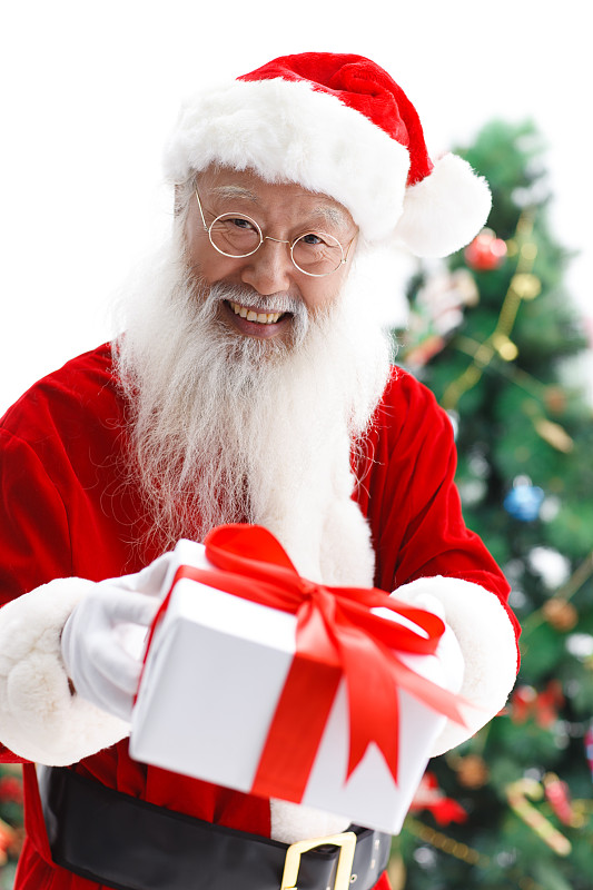 一个圣诞老人在派发圣诞礼物图片素材