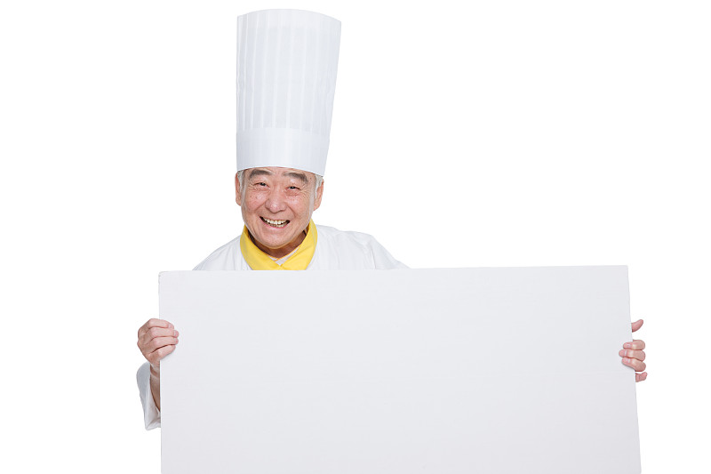 穿着厨师服的老年男人拿着白板图片素材