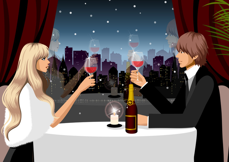 一对情侣在餐厅里拿着红酒图片素材