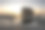旅游目的地:日落时分圣彼得奥丁海滩上的高跷小屋(德国石勒苏益格-荷尔斯泰因)摄影图片