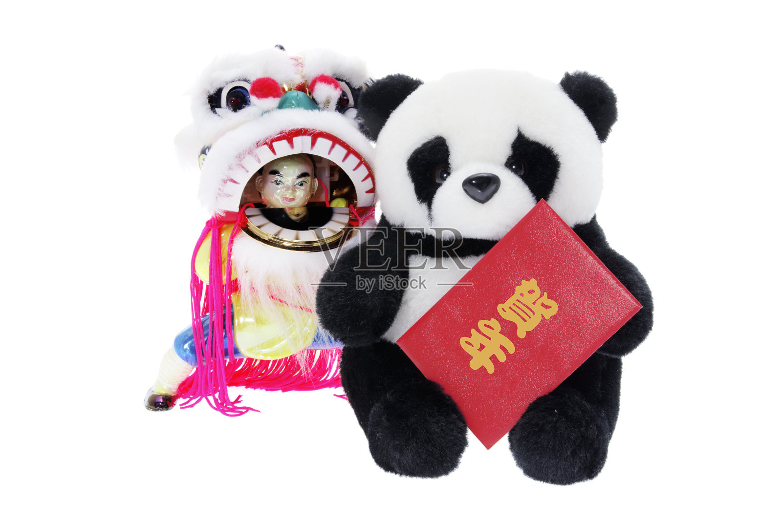 毛绒玩具熊猫和舞狮小雕像照片摄影图片