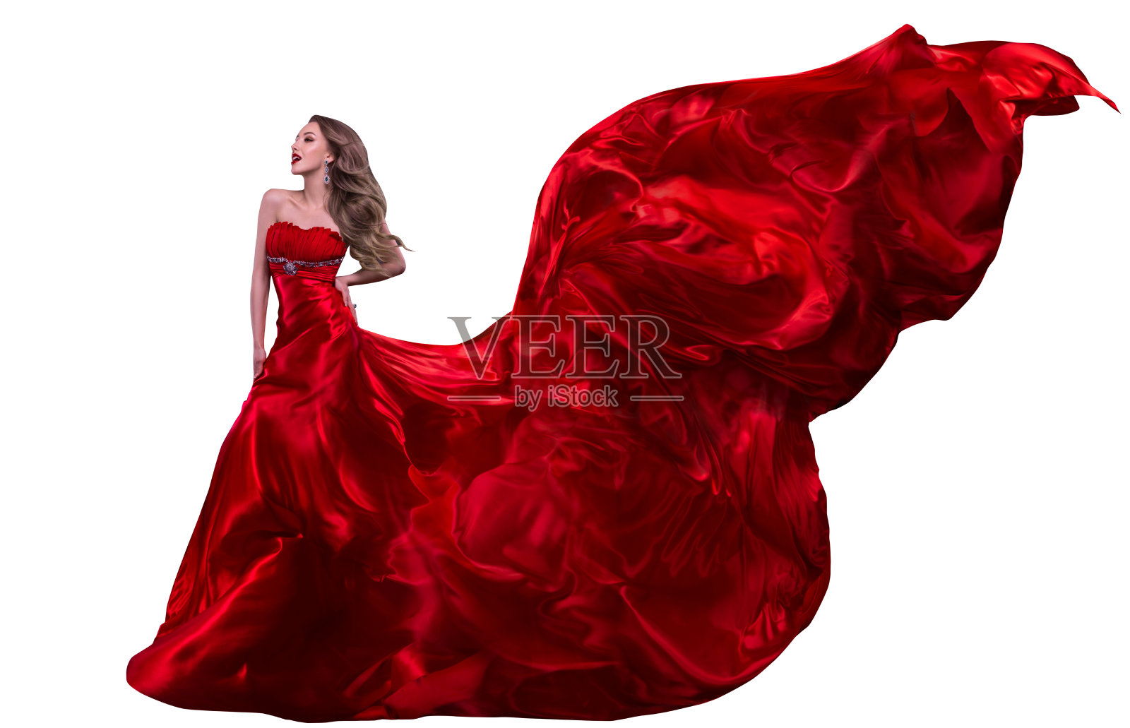 女装时尚红裙，迎风飘扬的长袍，飘动的丝绸面料照片摄影图片