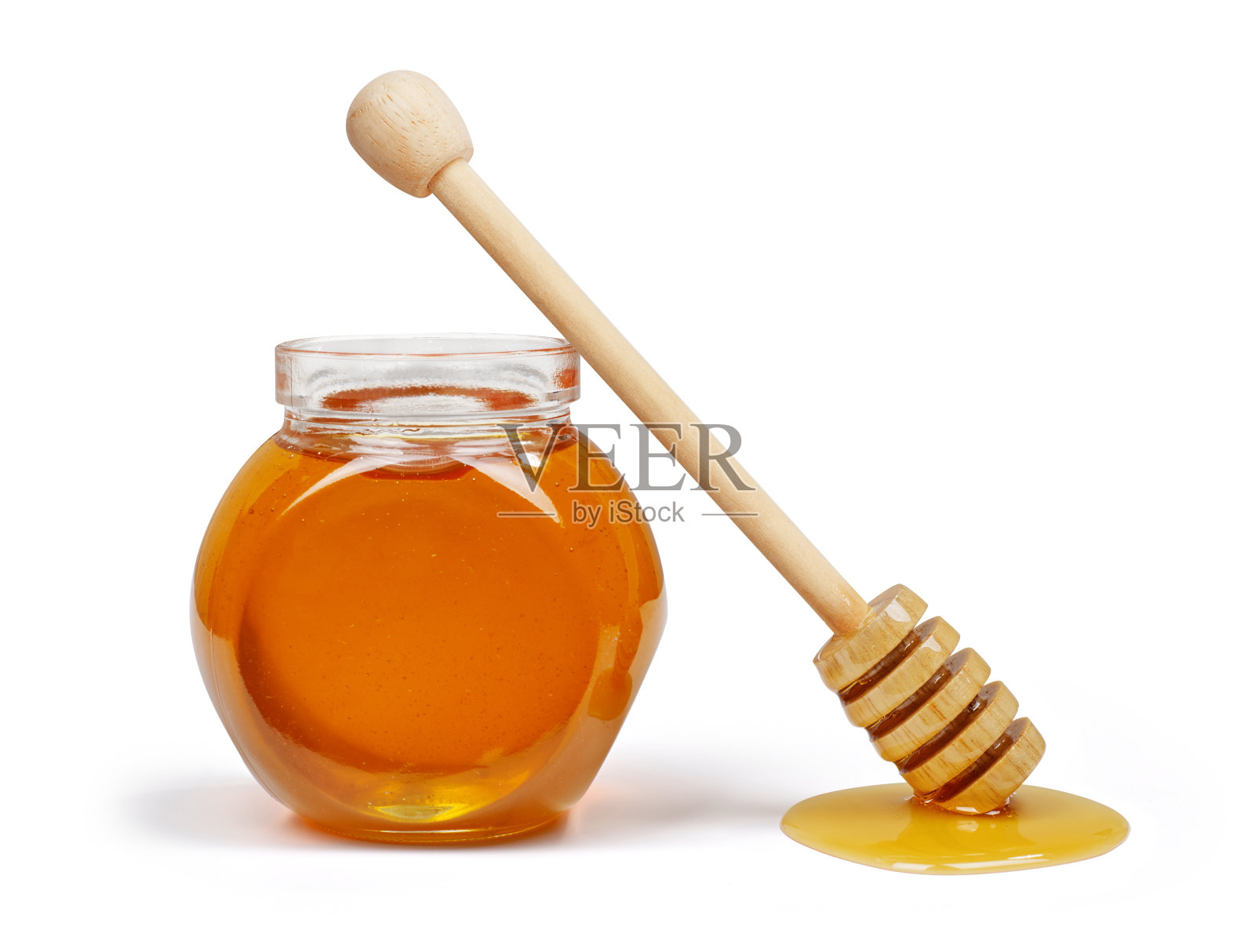 蜂蜜罐和蜂蜜勺照片摄影图片