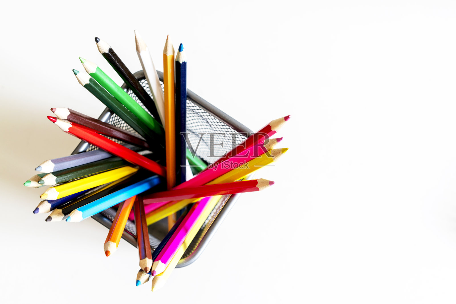 彩色铅笔在笔筒照片摄影图片
