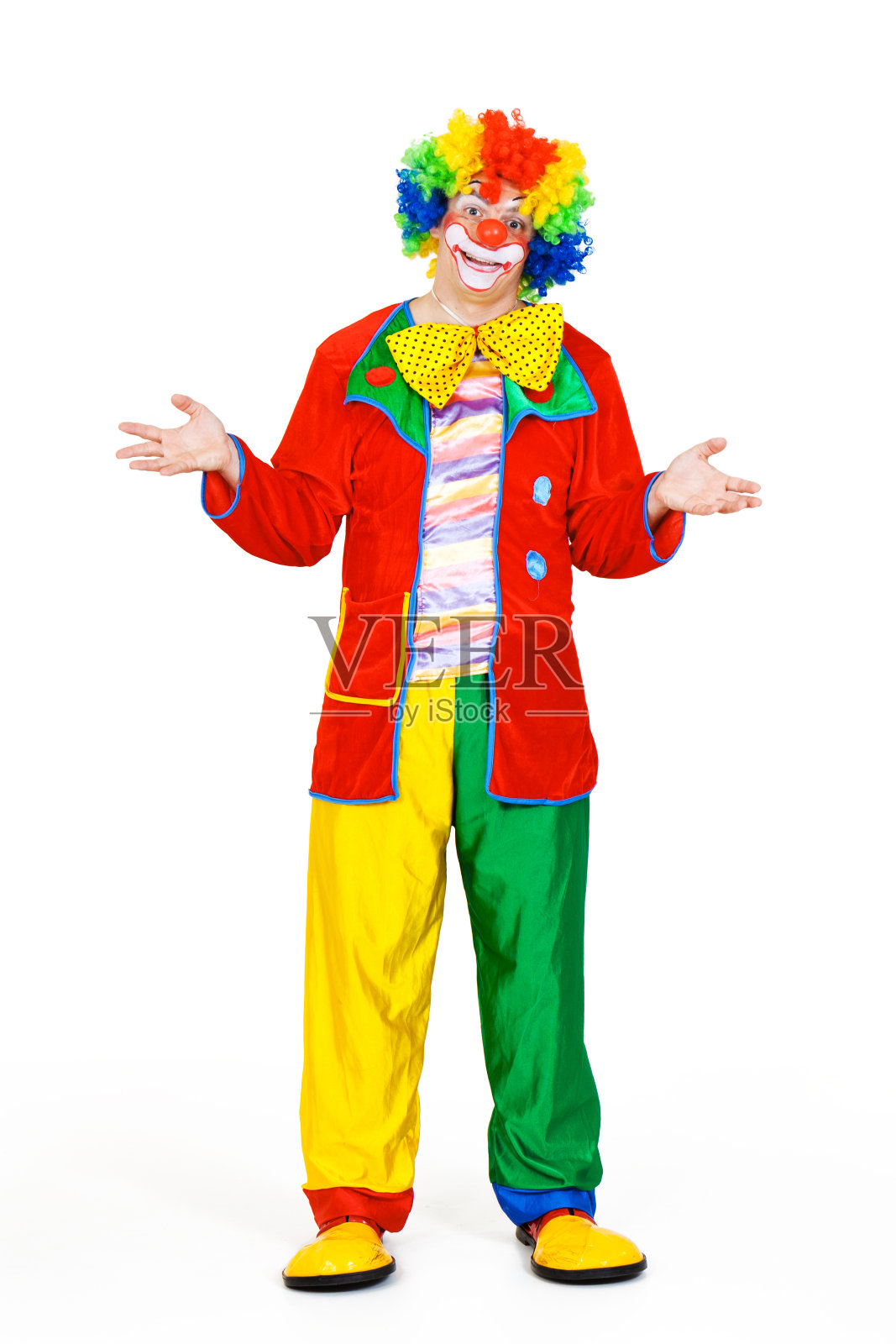 滑稽的男性小丑在五颜六色的服装照片摄影图片
