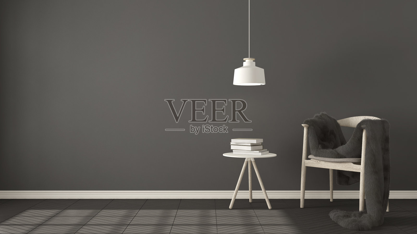 斯堪的纳维亚灰色背景，人字形天然拼花地板上配有桌子和吊灯，室内设计照片摄影图片