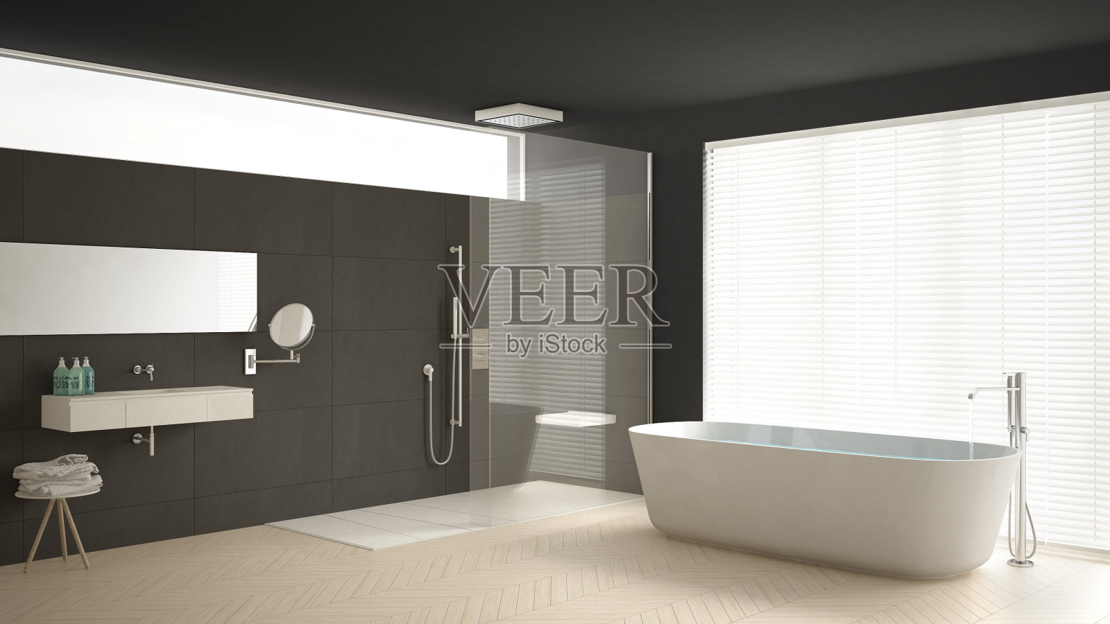 极简主义的浴室配有浴缸和淋浴，拼花地板和大理石瓷砖，经典的白色和灰色室内设计照片摄影图片