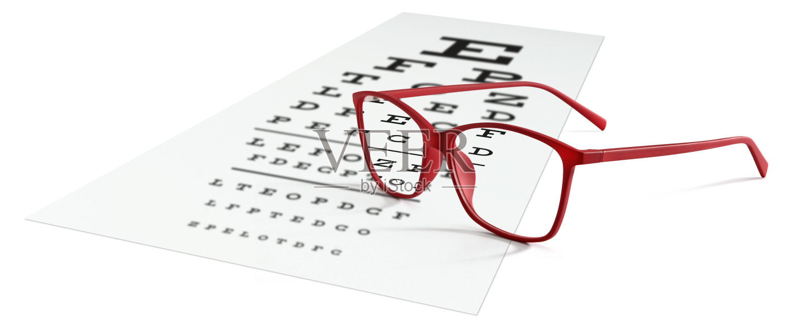 视觉测试表上的红色眼镜孤立在白色眼镜上。视力的概念照片摄影图片
