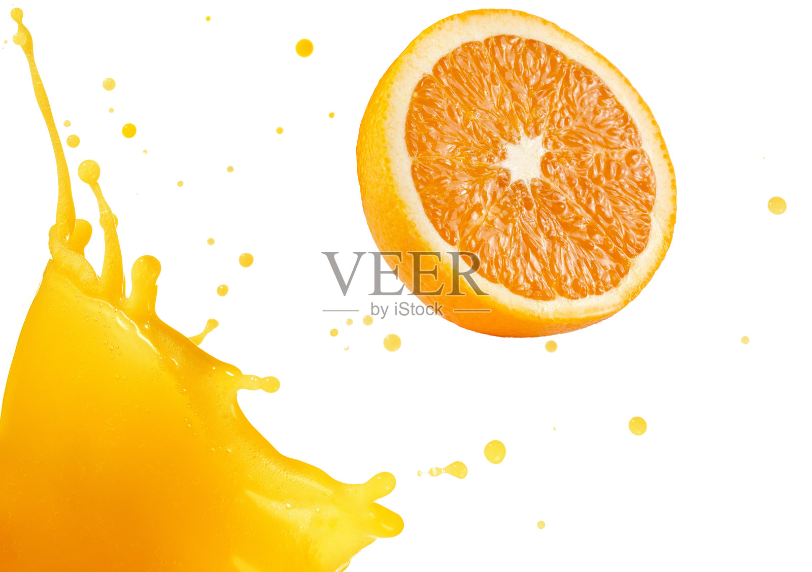 橙汁溅出来照片摄影图片