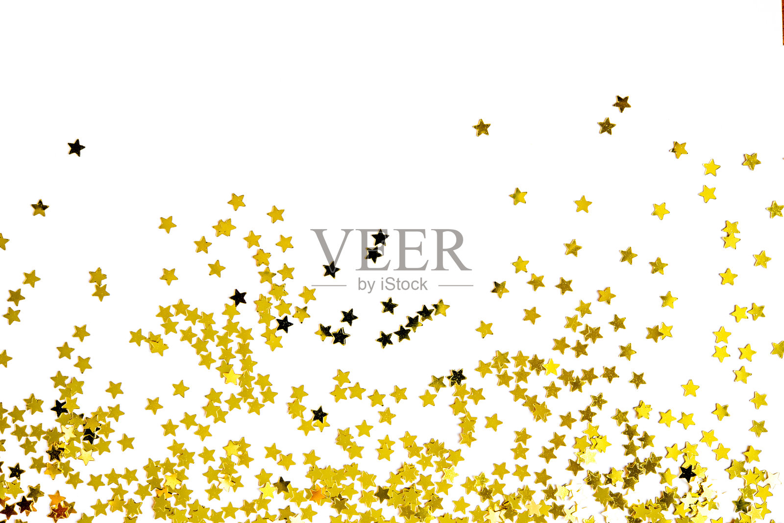 一组金色的星星装饰孤立在白色的背景对象设计在顶视图照片摄影图片