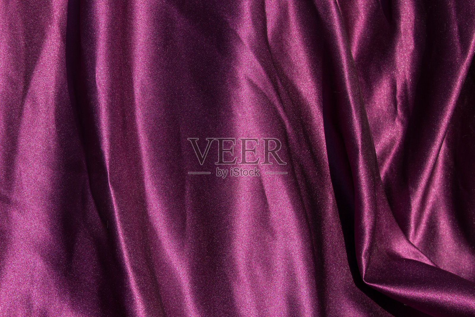 紫缎背景。丝绸质地。结构模式照片摄影图片