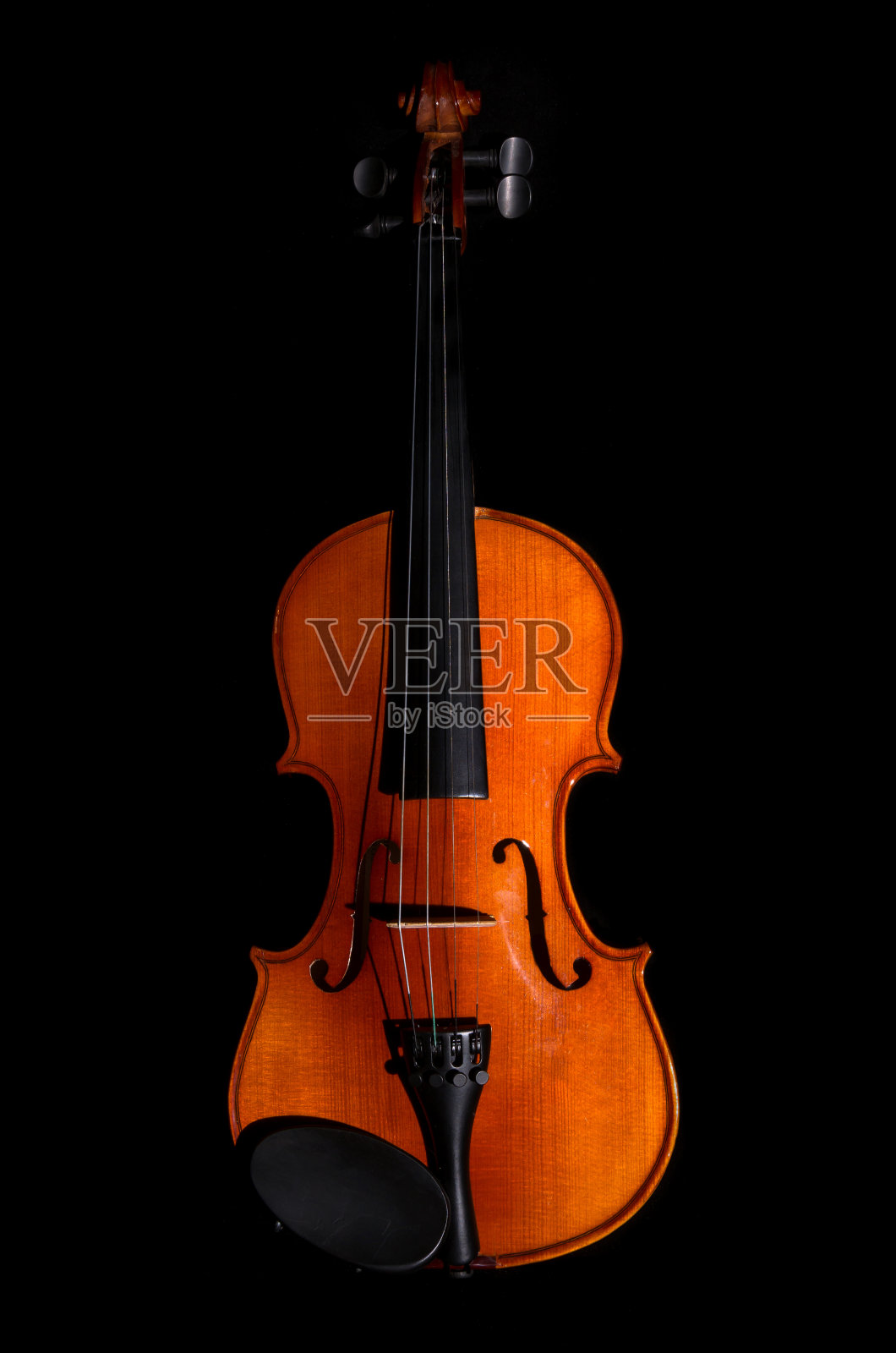 黑色背景上的小提琴管弦乐队乐器照片摄影图片