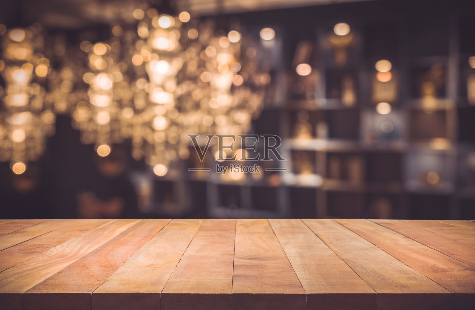 木桌子上模糊的咖啡馆(餐厅)背景照片摄影图片