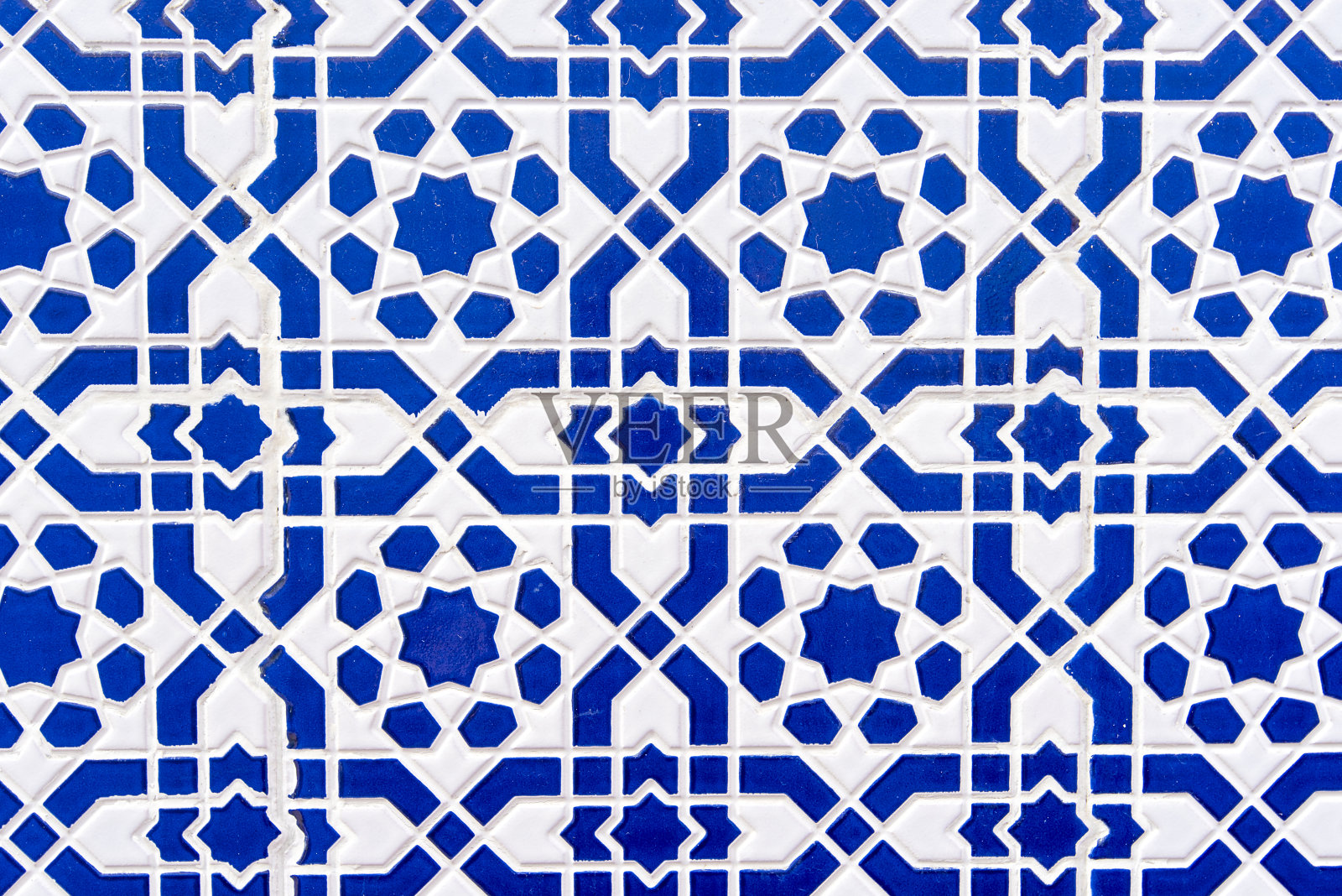 摩洛哥瓷砖以传统的阿拉伯图案、瓷砖图案为背景纹理照片摄影图片