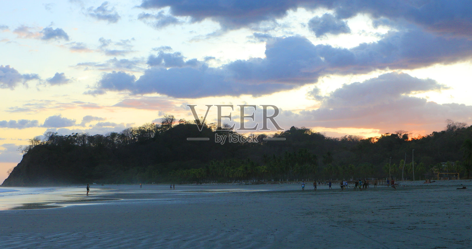 哥斯达黎加海滩上的日落照片摄影图片