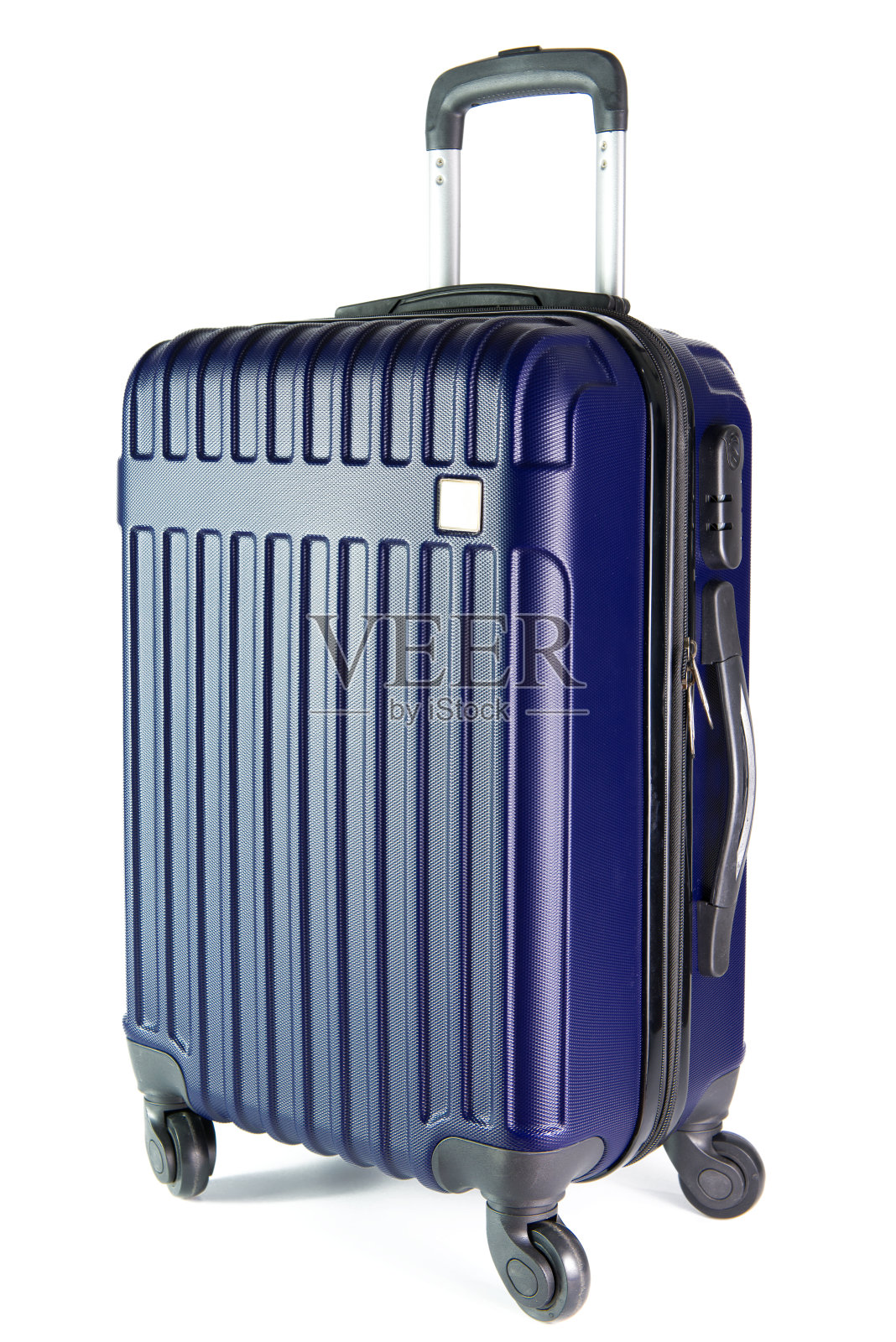 白色背景上孤立的蓝色旅行行李照片摄影图片