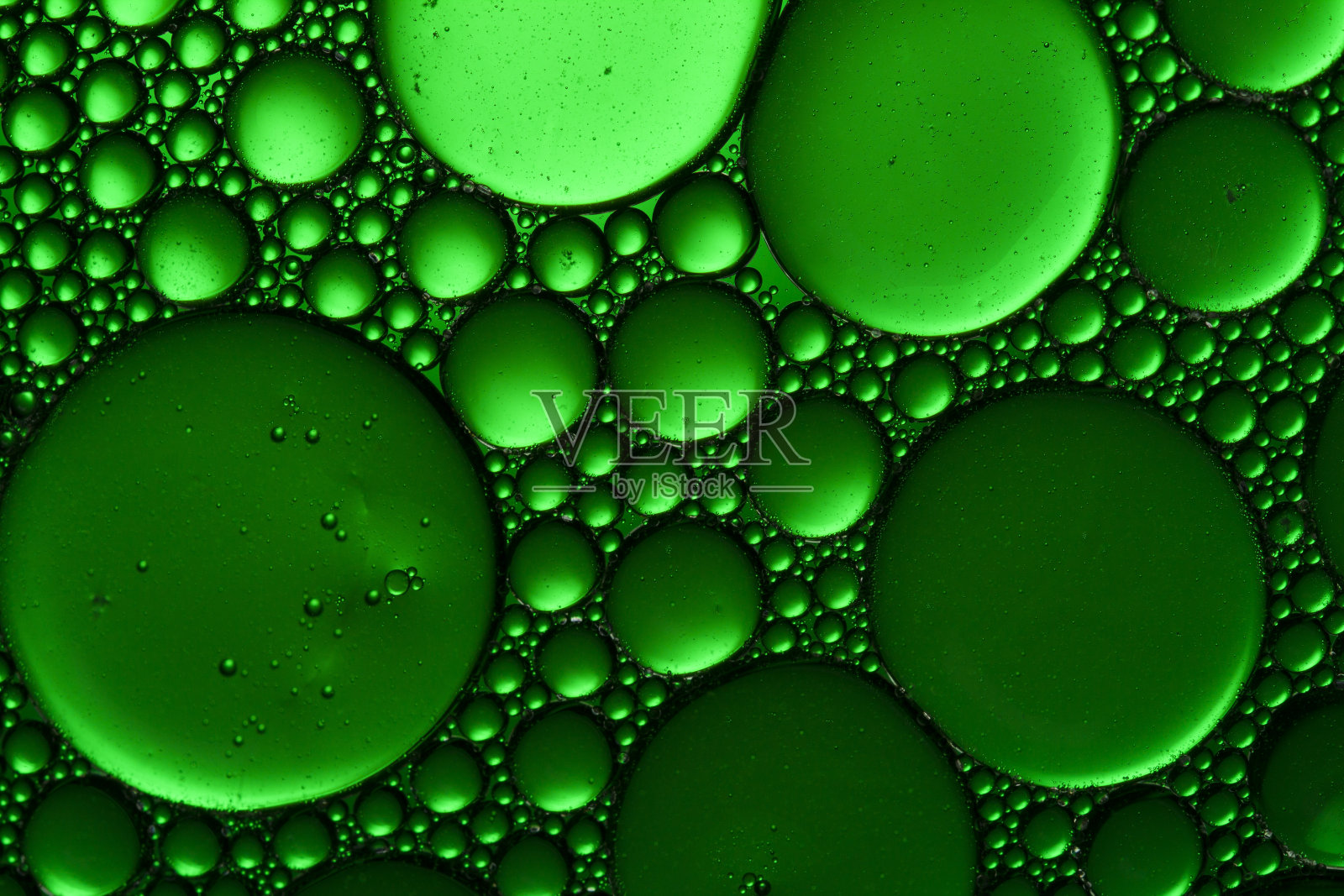 绿色水泡背景。绿色水滴背景照片摄影图片