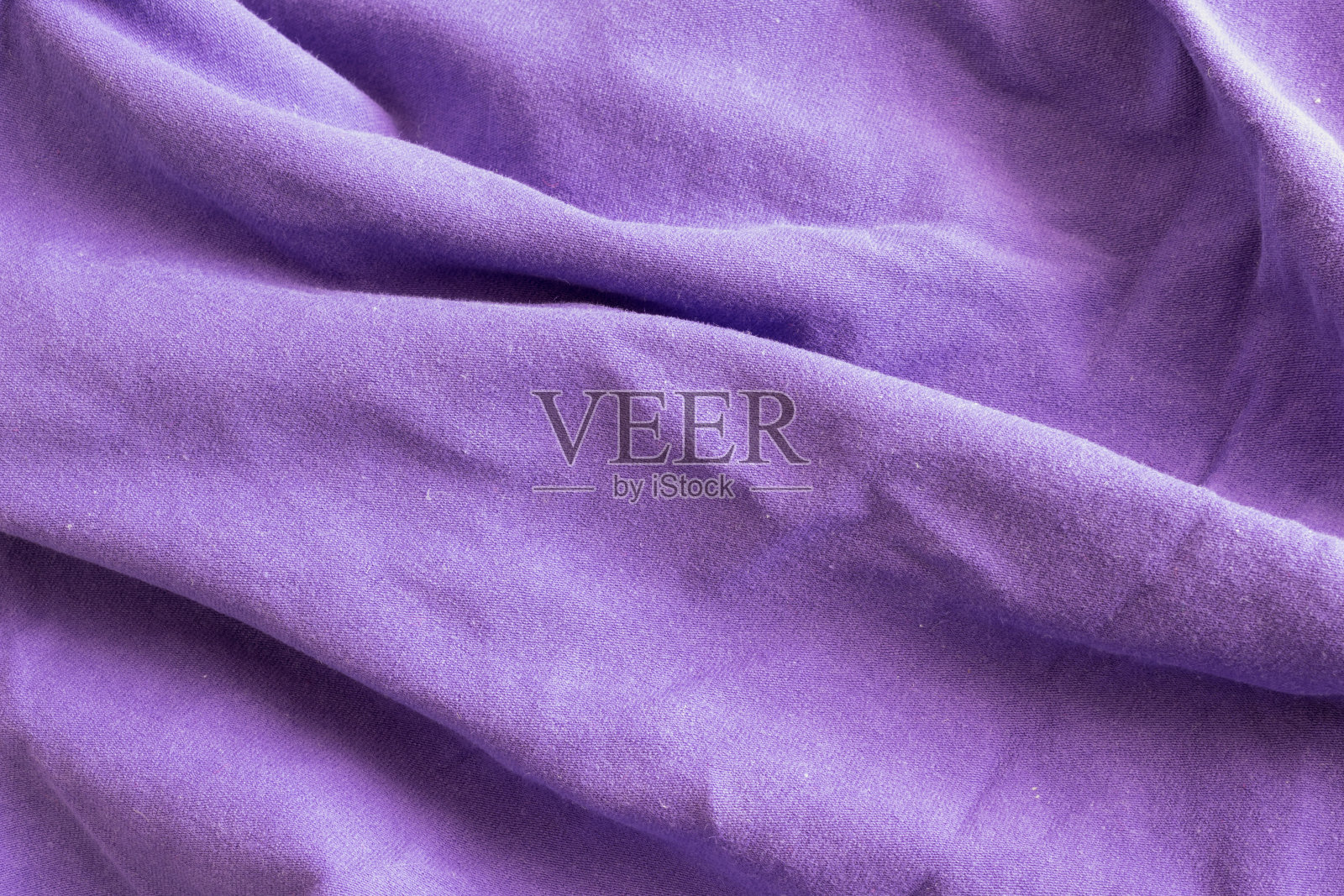 皱紫棉材料。纹理或背景照片摄影图片