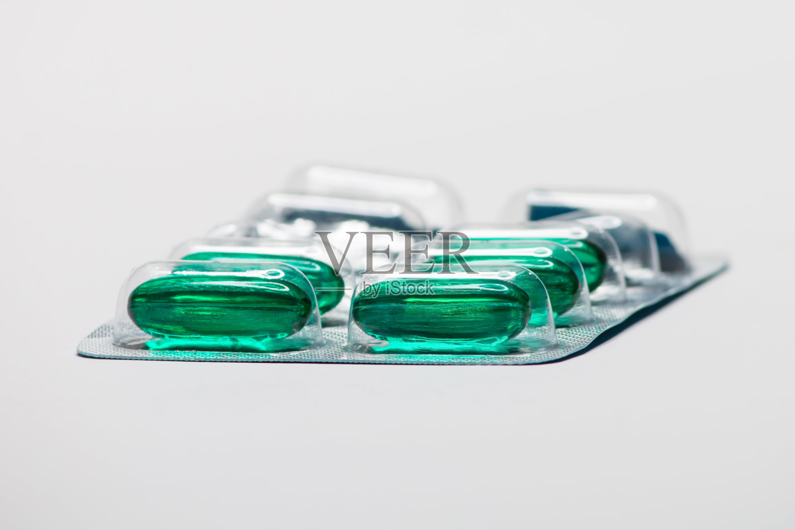 绿色药片包装药丸，治疗冠状病毒的基本药物照片摄影图片