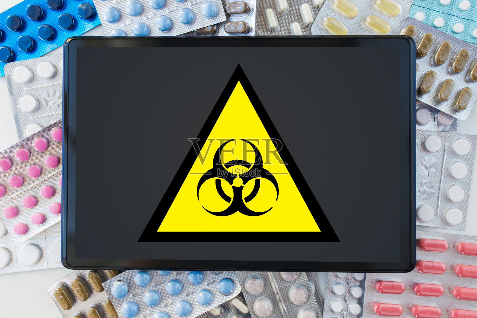 Boihazard警示标志，药片PC和药物照片摄影图片