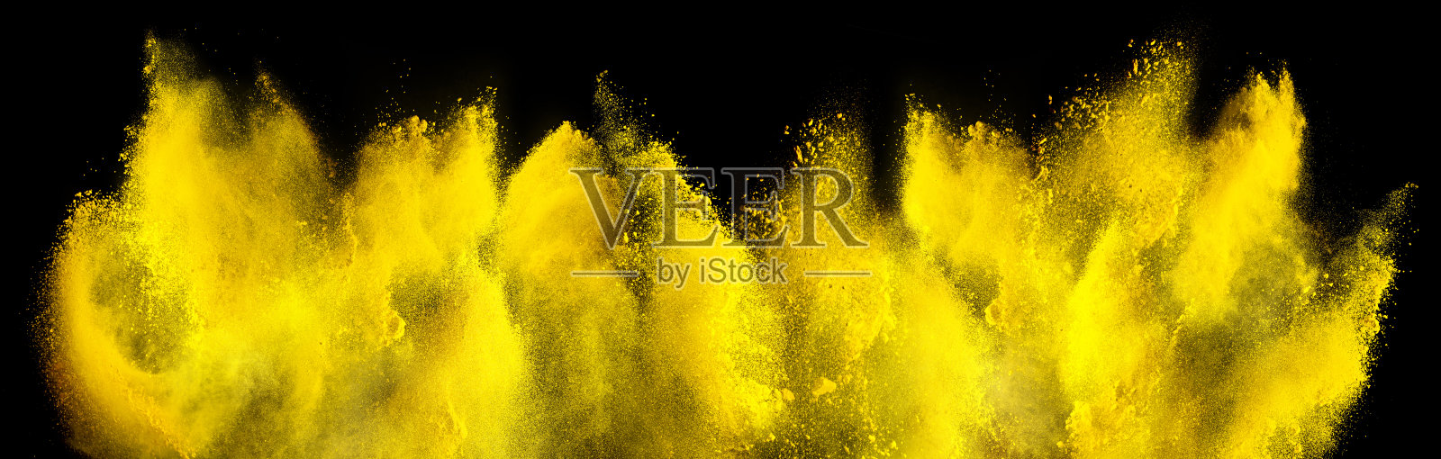黄色胡里漆颜色粉末爆炸孤立暗黑色背景。行业美丽派对节日理念照片摄影图片