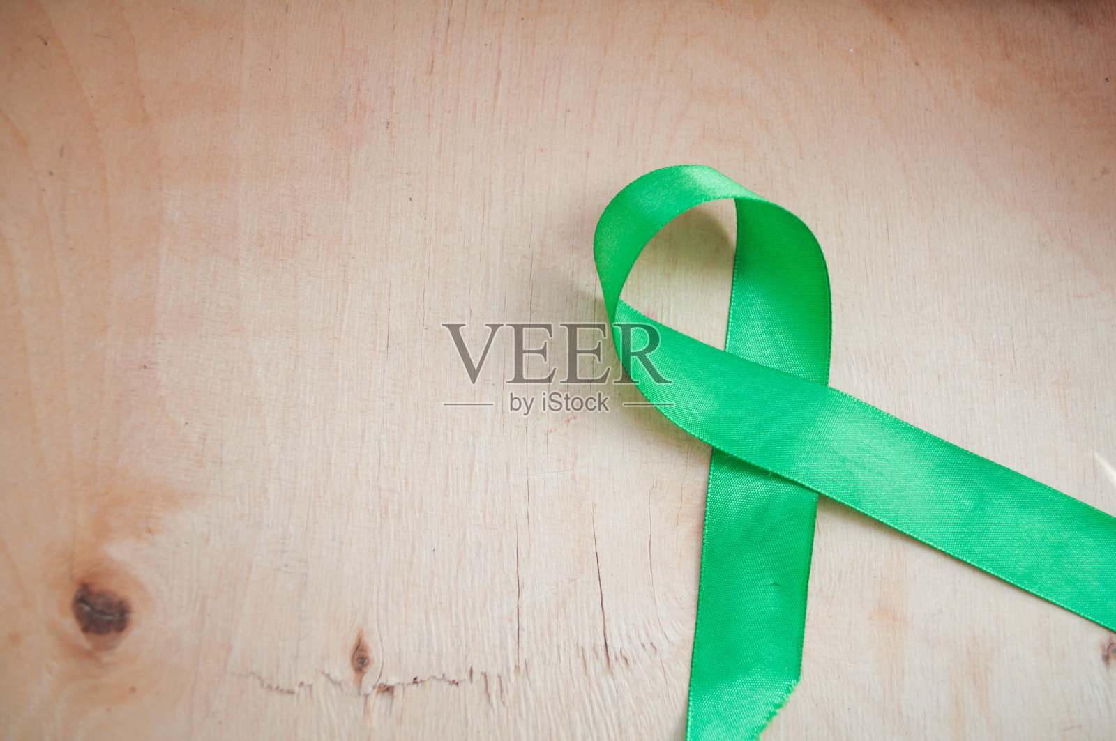 绿色意识丝带，精神健康和淋巴瘤，世界精神卫生日照片摄影图片
