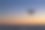 黎明时分，一架无人机飞过海洋素材图片