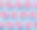 蓝色背景上的粉色环形甜甜圈素材图片