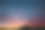 奇妙的梯度日落云景，山的剪影在图像的底部素材图片