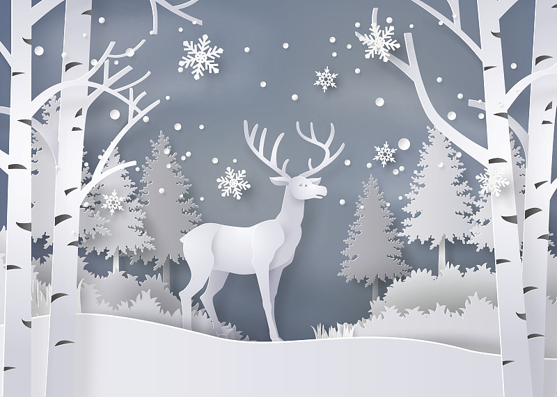 鹿在白雪覆盖的森林里。图片下载